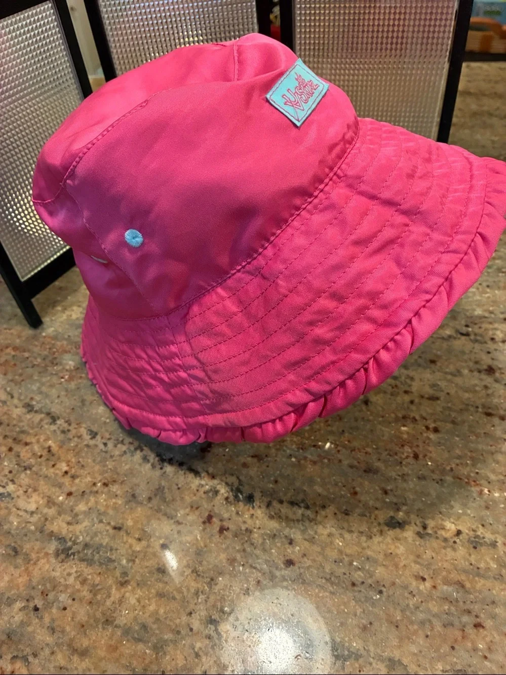 UV Skinz Reversible Bucket Hat Pink side/tropical pattern side UPF 50+, size 6